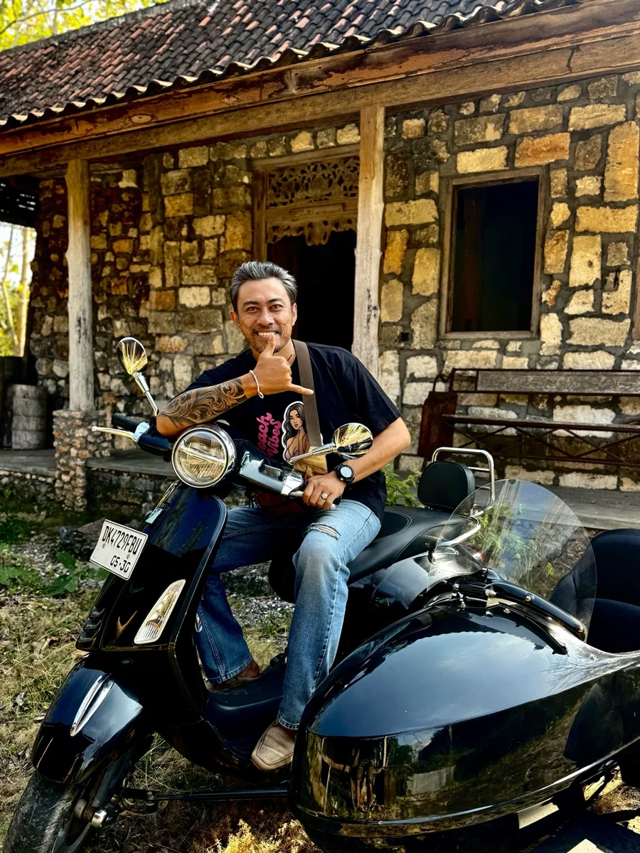 Putra, Island Sidecar Tours guide, with his sidecar