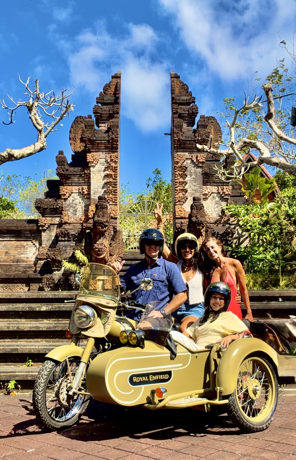Guest enjoying a Royal Enfield sidecar in Bali